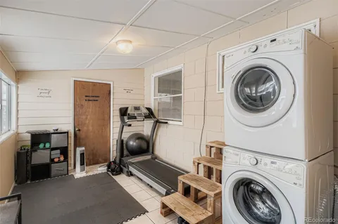 a view of a storage & utility room with washer and dryer