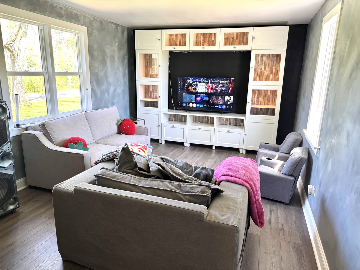 931 South Rawson Bridge Road Cary, IL 60013 - Photo 12 of 36 a living room with furniture and a flat screen tv