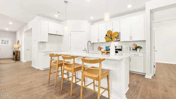 a living room with furniture and window