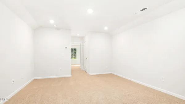 a kitchen with a sink cabinets and window