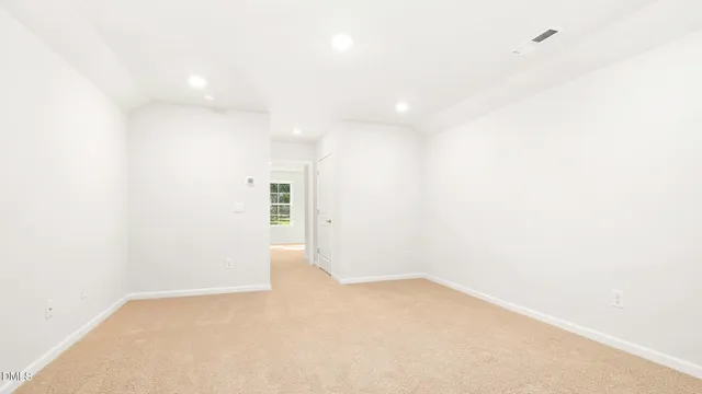 a kitchen with a sink cabinets and window