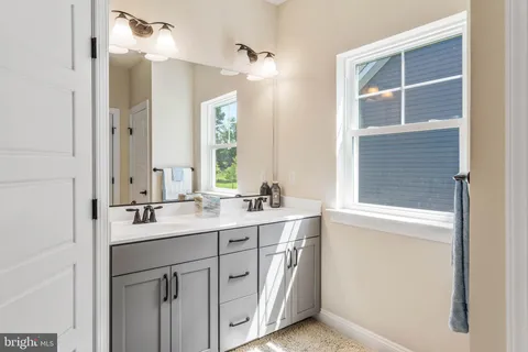 a room with furniture and a window