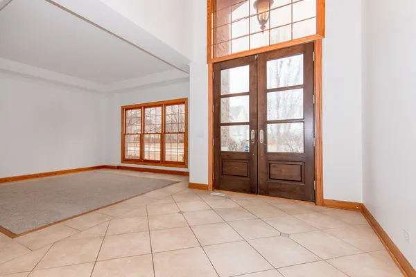 a view of empty room with windows