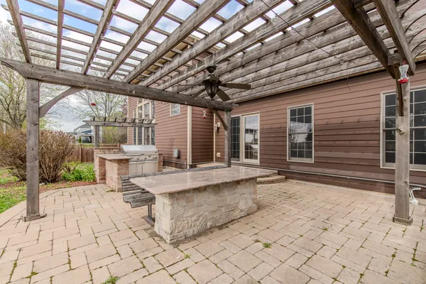 a view of a lounge chairs in the patio