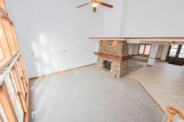 a view of staircase with white walls