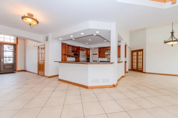 a kitchen with stainless steel appliances granite countertop a sink and cabinets