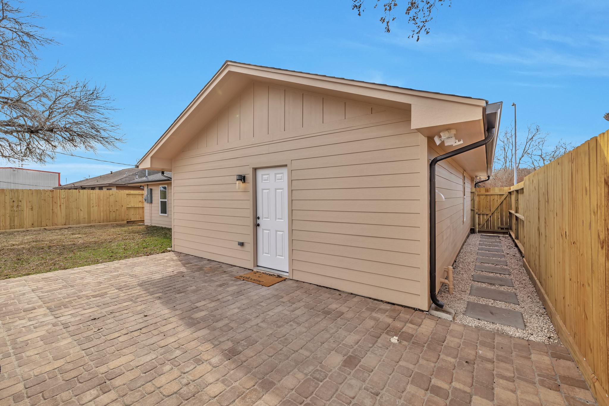 8709 Tarbell Road Houston, TX 77034 - Photo 18 of 25 a view of backyard of garage