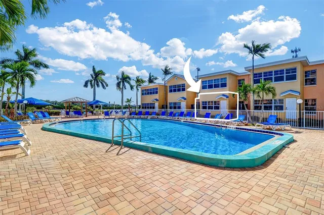 a view of an house with swimming pool