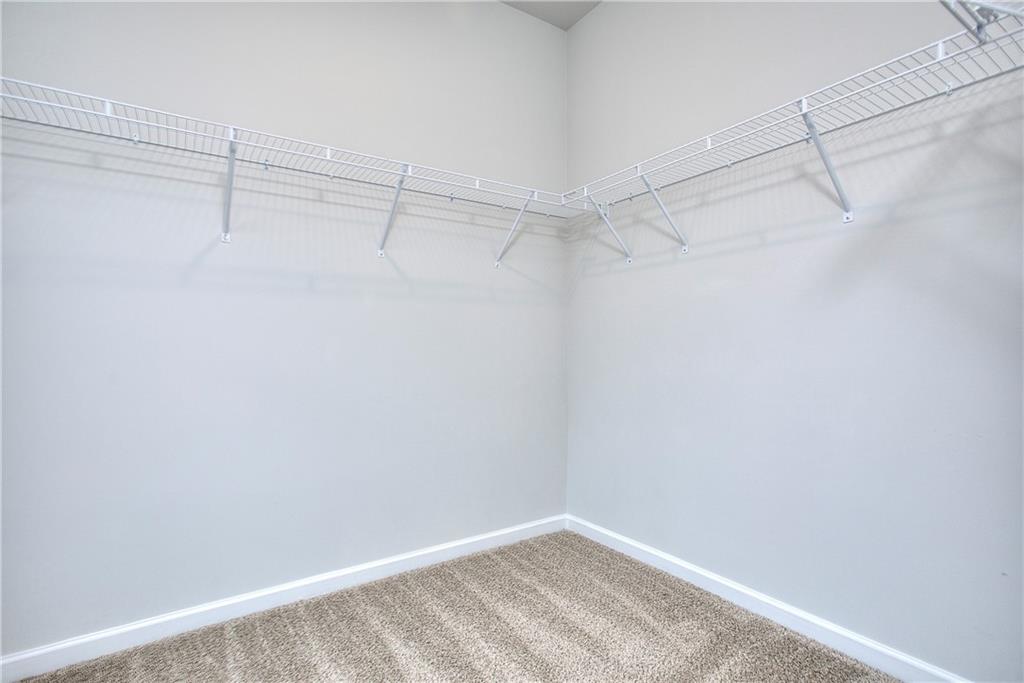 115 Greenview Court Homer, GA 30547 - Photo 23 of 32 a view of a room with racks on the wall