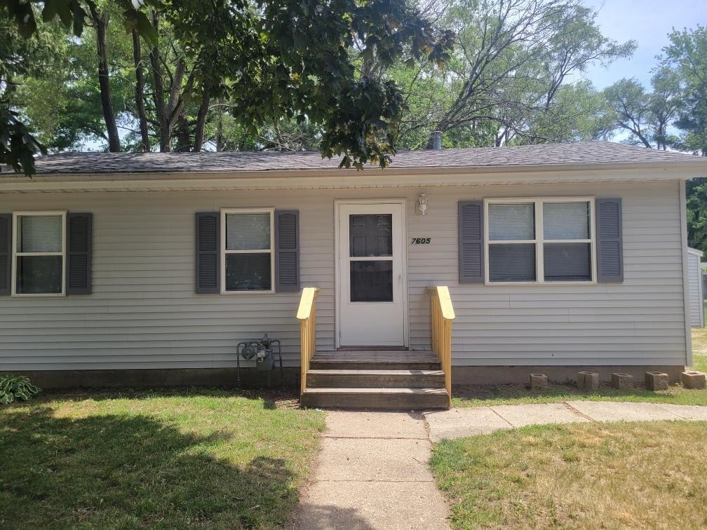 7605 Randy Road Machesney Park, IL 61115 - Photo 1 of 1 a view of a house with a yard