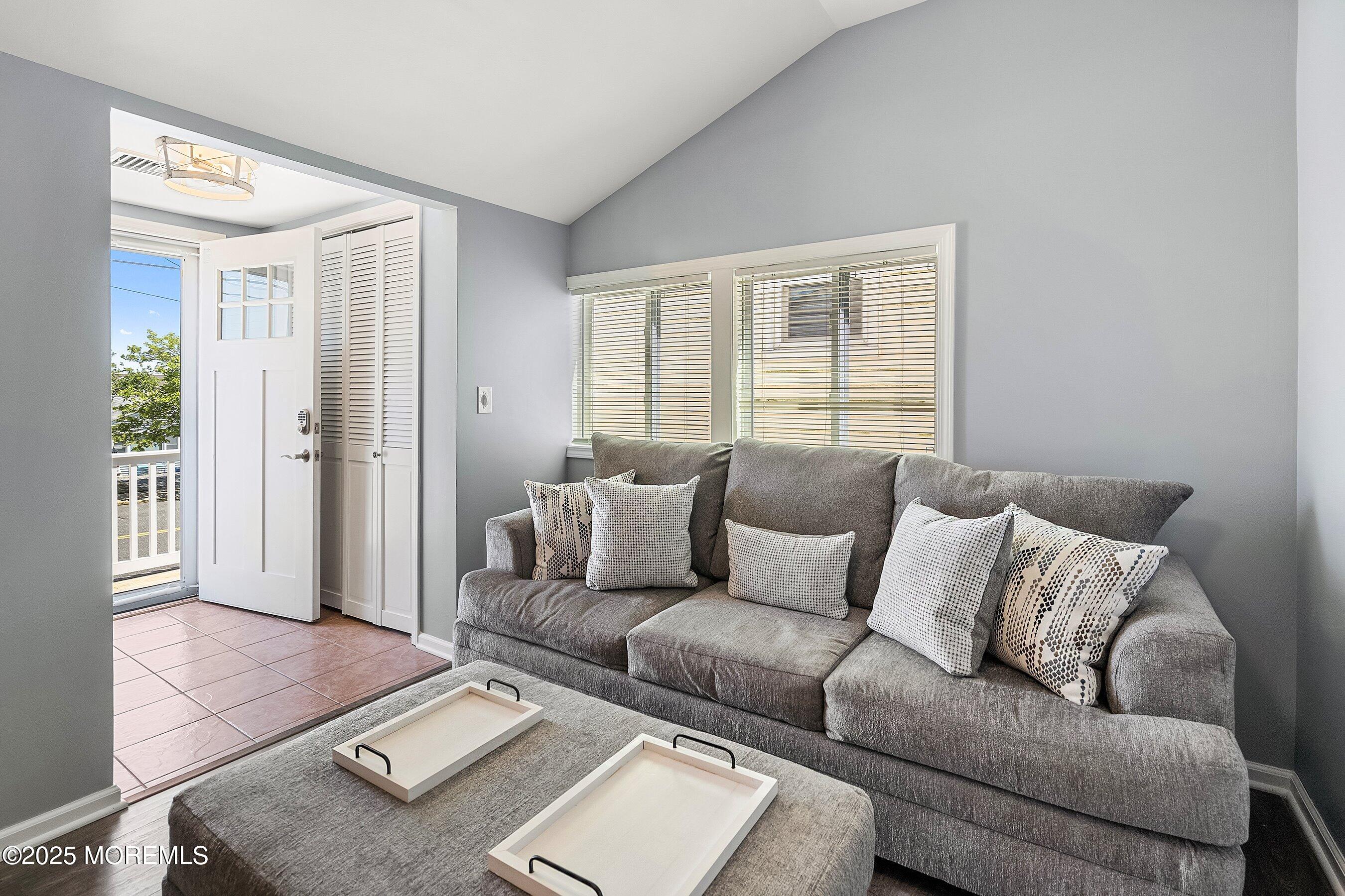 309 Hiering Avenue, Unit A Seaside Heights, NJ 08751 - Photo 12 of 18 a living room with furniture and a window