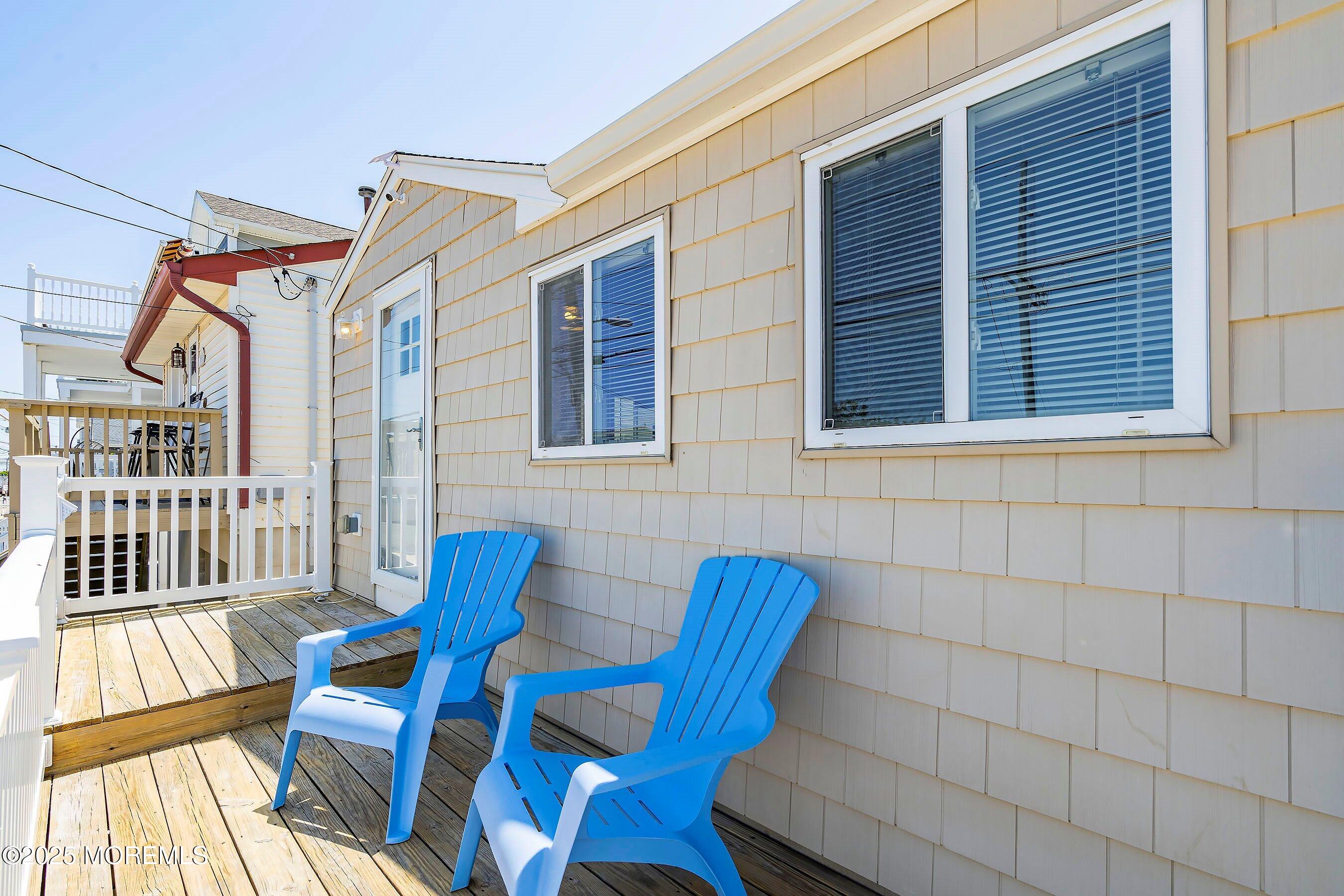 309 Hiering Avenue, Unit A Seaside Heights, NJ 08751 - Photo 2 of 18 a view of a two chairs in the balcony