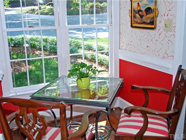 1306 Hampshire Court Raleigh, NC 27612 - Photo 8 of 12 a view of an chairs and table in the patio