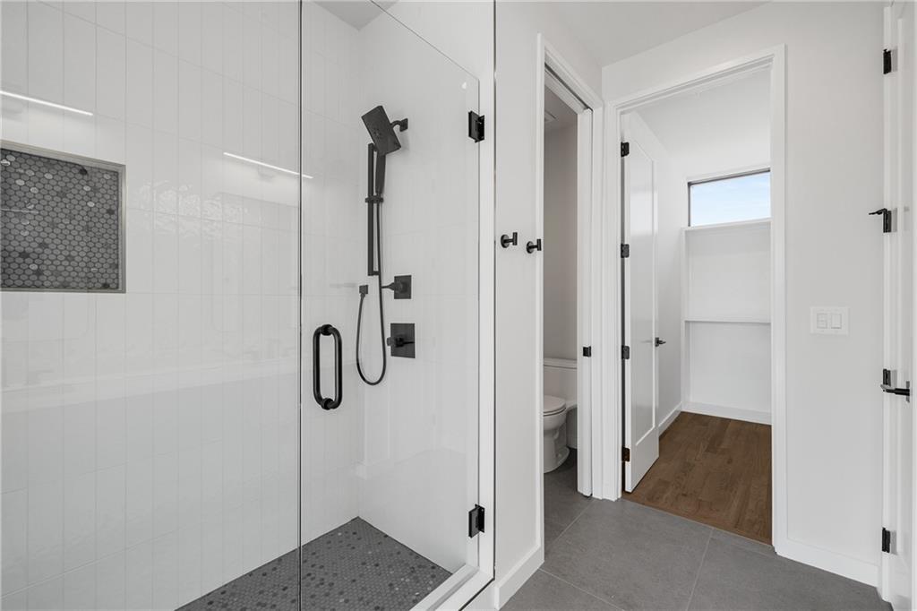 105 Georgia Avenue Southeast, Unit 8 Atlanta, GA 30312 - Photo 13 of 33 a bathroom with a shower