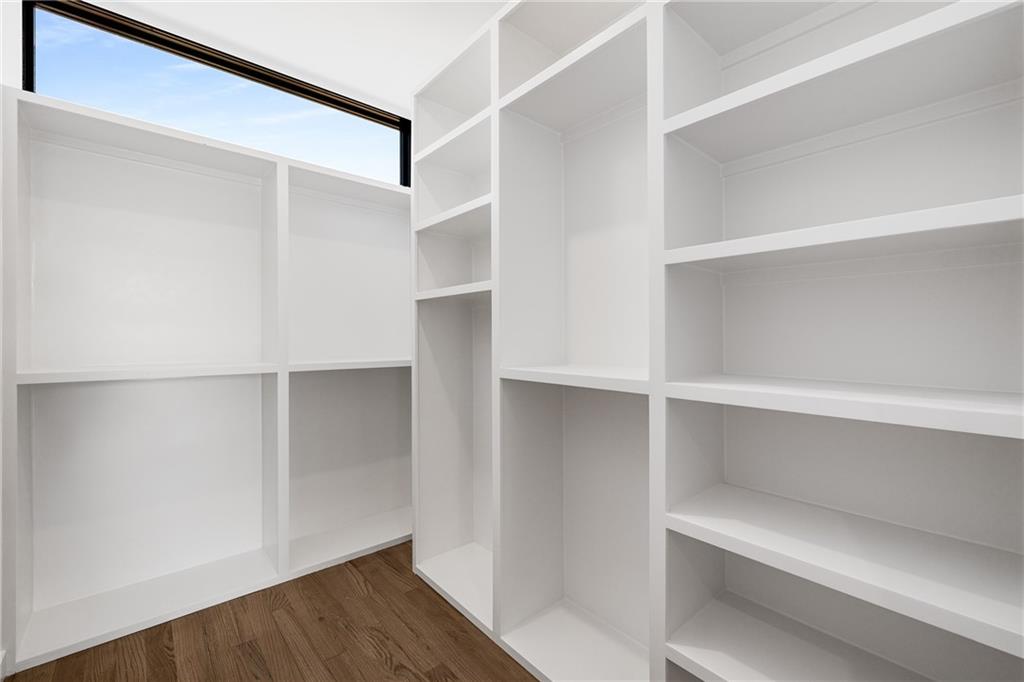 105 Georgia Avenue Southeast, Unit 8 Atlanta, GA 30312 - Photo 14 of 33 a view of walk in closet with empty racks