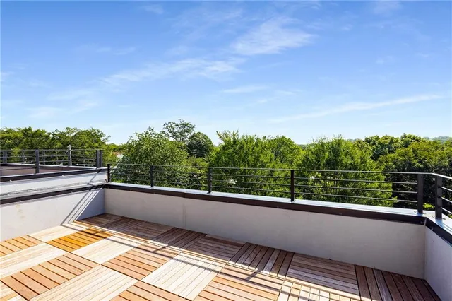 a view of balcony with furniture