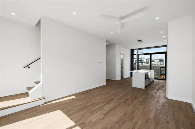 a view of a living room and hardwood floor