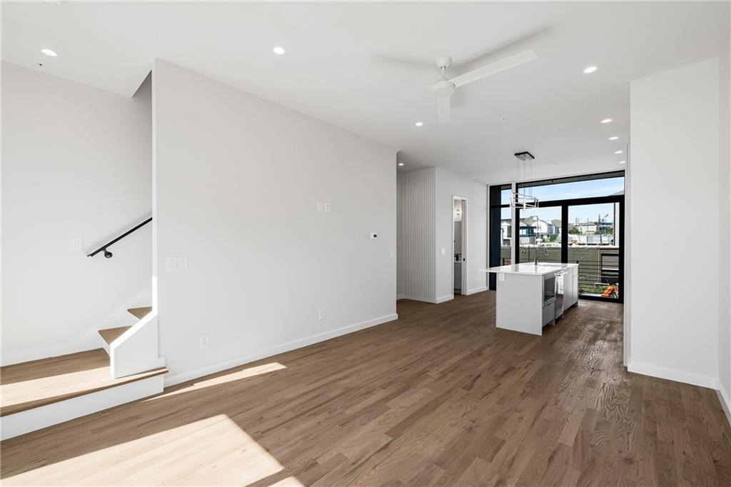 105 Georgia Avenue Southeast, Unit 8 Atlanta, GA 30312 - Photo 8 of 33 a view of a living room and hardwood floor