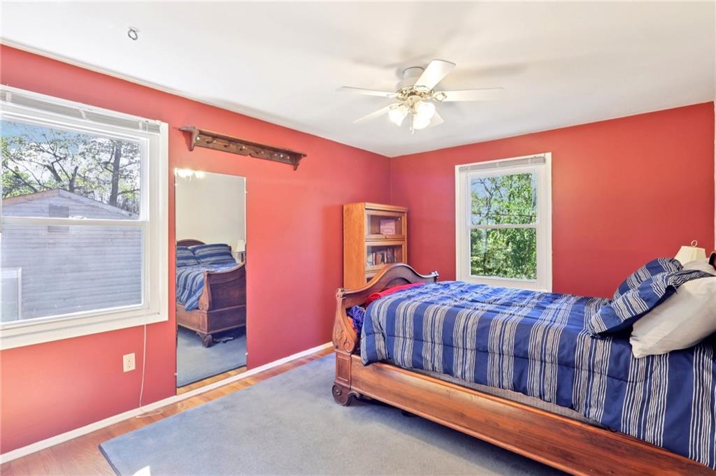 675 Blue Ridge Road Pittsburgh, PA 15239 - Photo 32 of 42 a bed room with a bed and a window
