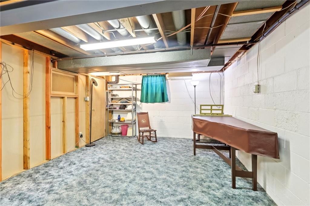 675 Blue Ridge Road Pittsburgh, PA 15239 - Photo 34 of 42 a view of a room with gym equipment