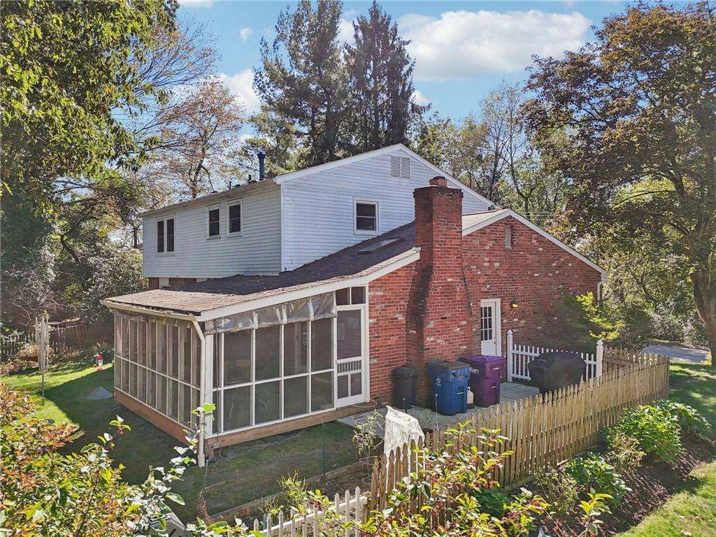 675 Blue Ridge Road Pittsburgh, PA 15239 - Photo 36 of 42 a view of a house with a yard