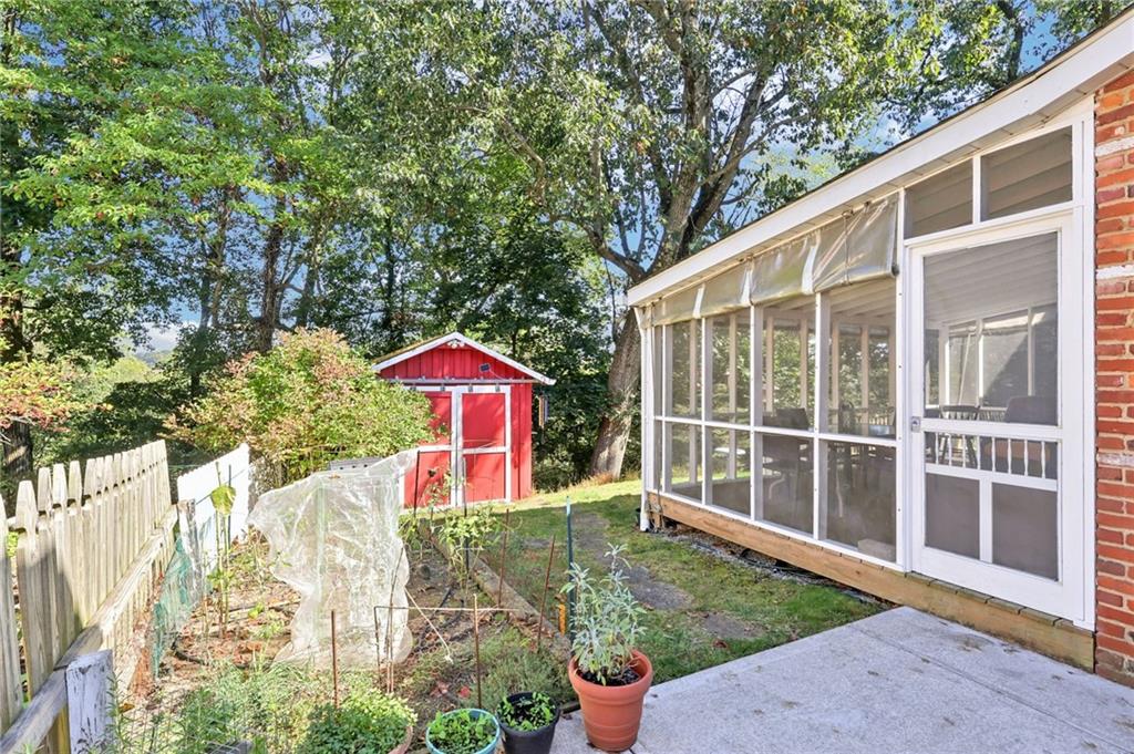 675 Blue Ridge Road Pittsburgh, PA 15239 - Photo 37 of 42 a view of a house with a yard and sitting area