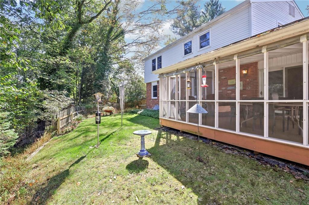 675 Blue Ridge Road Pittsburgh, PA 15239 - Photo 38 of 42 a view of a house with backyard and sitting area