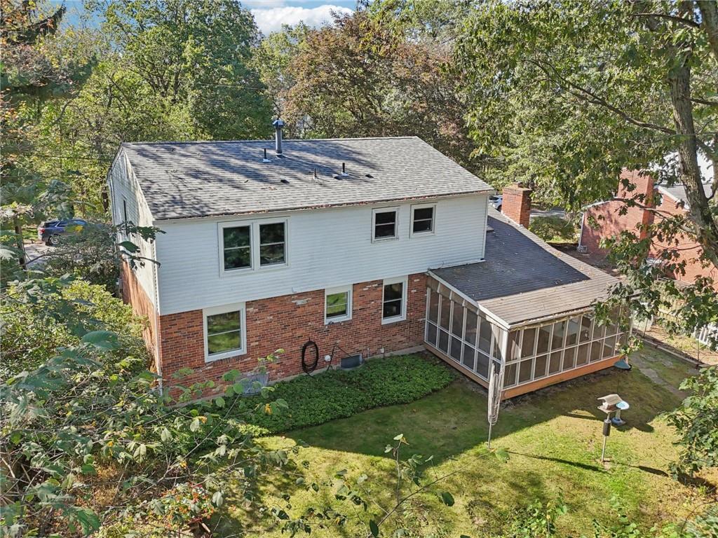 675 Blue Ridge Road Pittsburgh, PA 15239 - Photo 42 of 42 a view of a house with a yard and roof deck