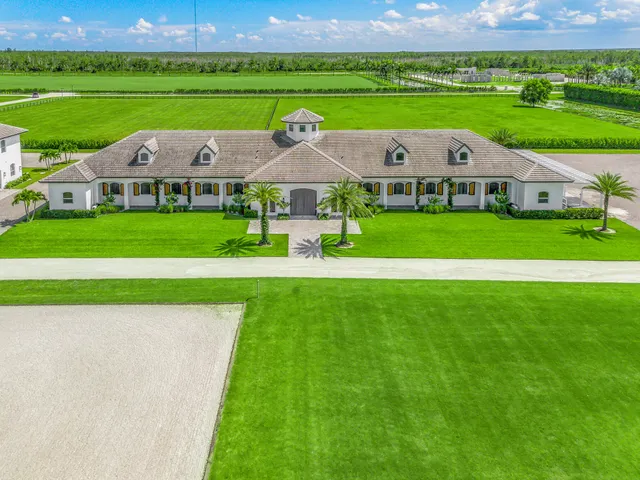 a aerial view of a house with a garden