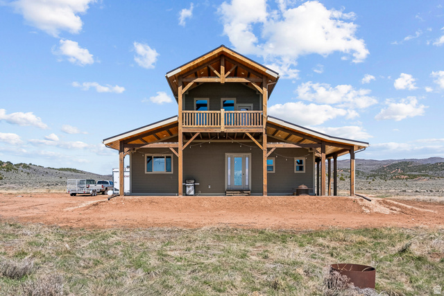46997 West Thunder Road Fruitland, UT 84027 - Photo 39 of 49 Back of house with a patio and a deck with mountain view