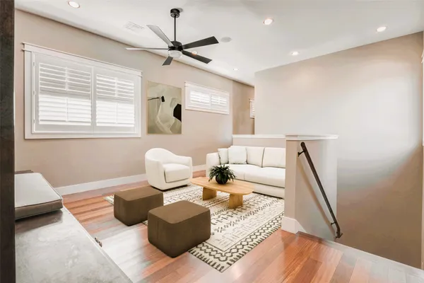 a living room with furniture and a window