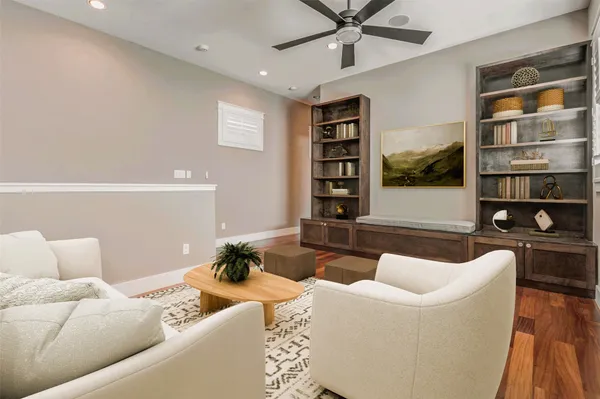 a living room with furniture and a window