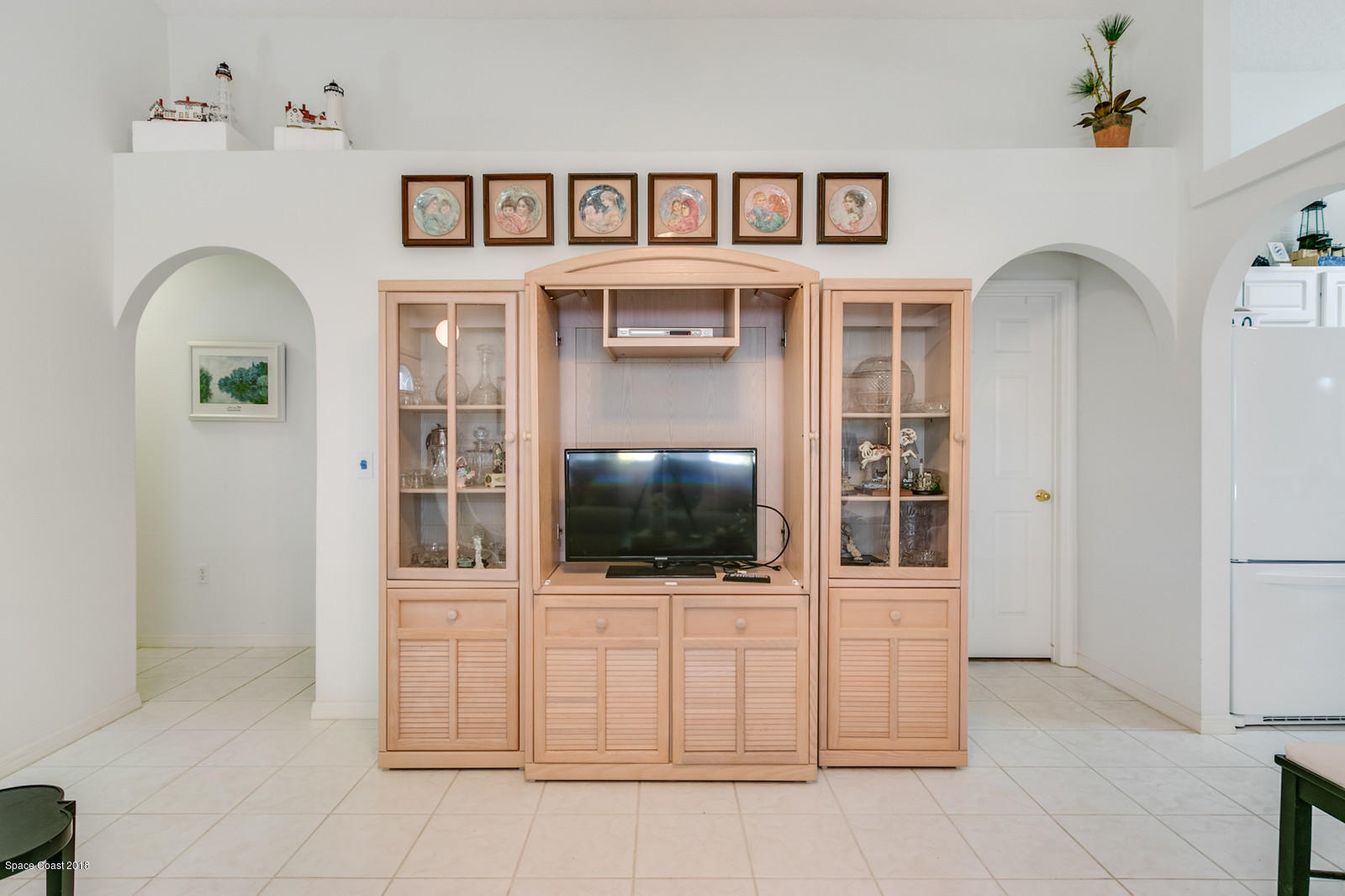 2009 Redwood Circle Palm Bay, FL 32905 - Photo 30 of 32 a front view of a house with entryway