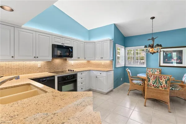 $479,900 | 13055 Castle Harbour Drive, Unit K11, Naples, FL 34110