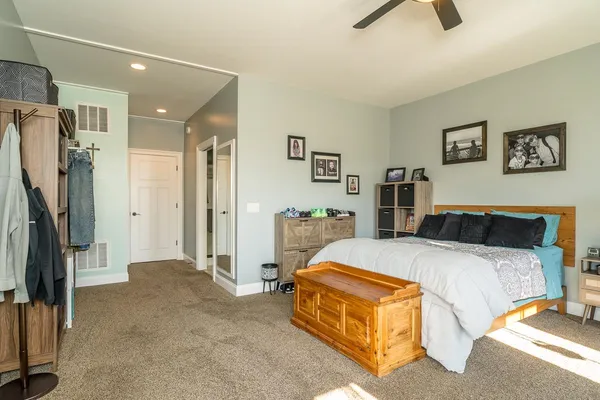 a room with furniture and flat screen tv