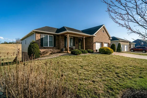a view of a deck with wooden floor and furniture