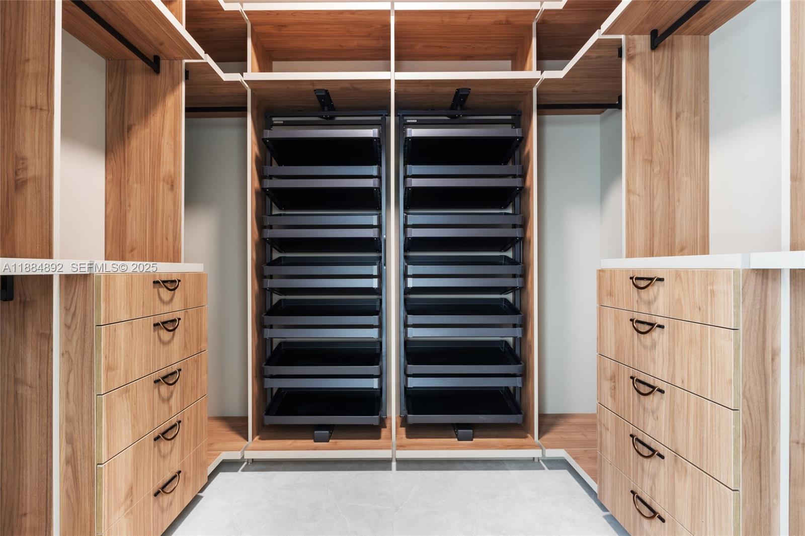 2523 Red Road Miami, FL 33134 - Photo 26 of 39 a view of walk in closet with empty racks