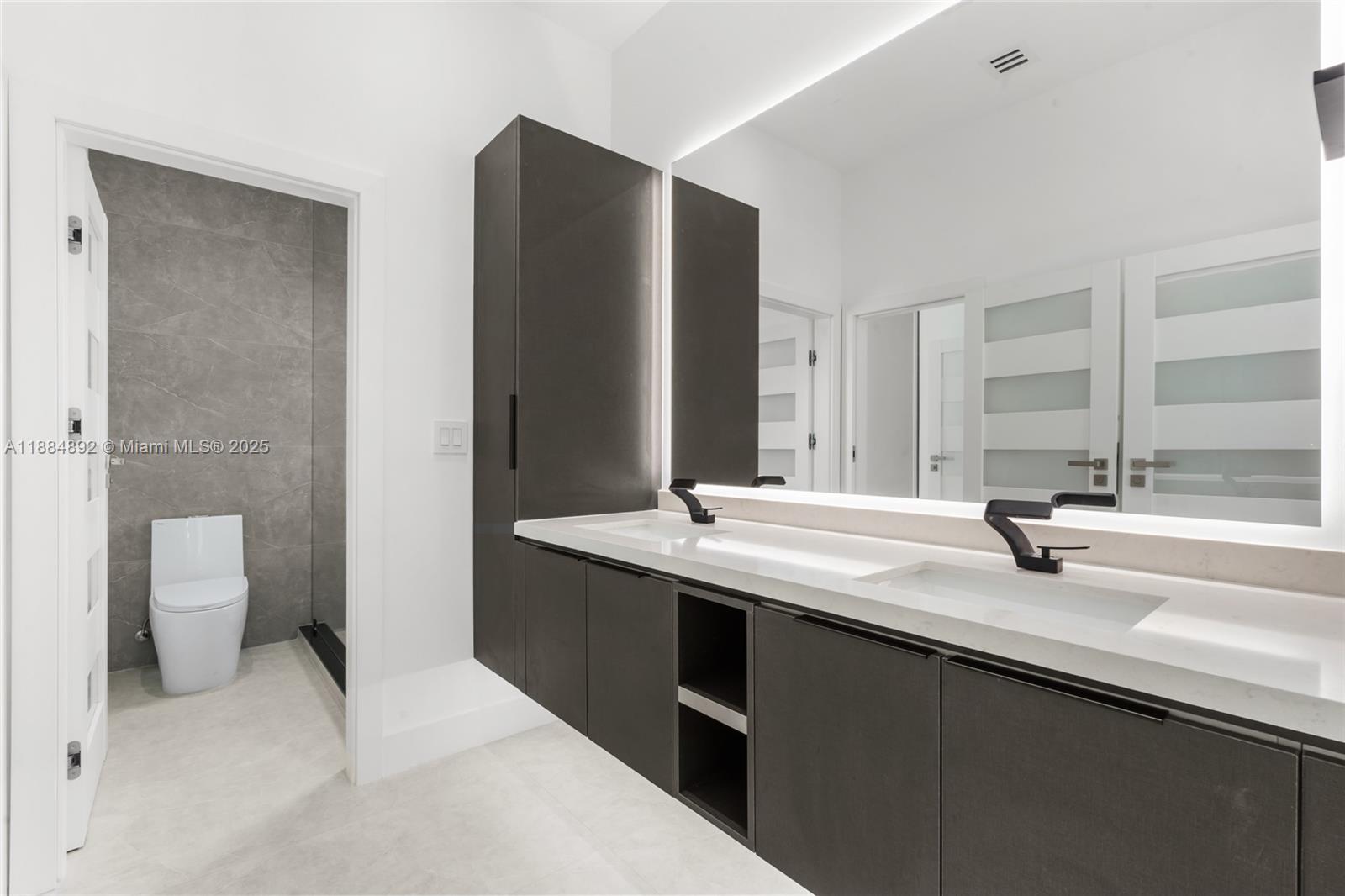 2523 Red Road Miami, FL 33134 - Photo 32 of 39 JACK AND JILL BATHROOM