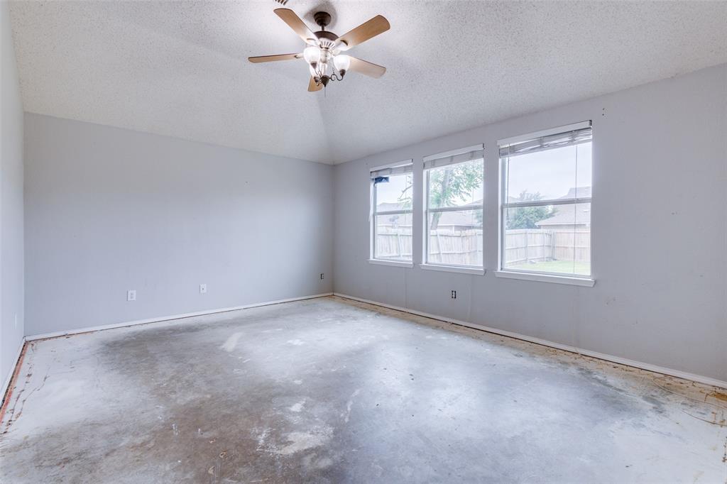 107 Bowie Street Forney, TX 75126 - Photo 15 of 25 a view of an empty room with a window