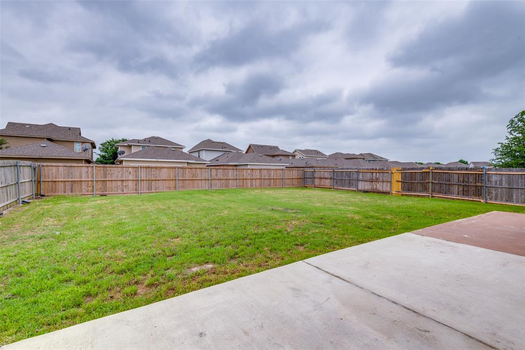 107 Bowie Street Forney, TX 75126 - Photo 23 of 25 a view of outdoor space with yard and barbeque oven