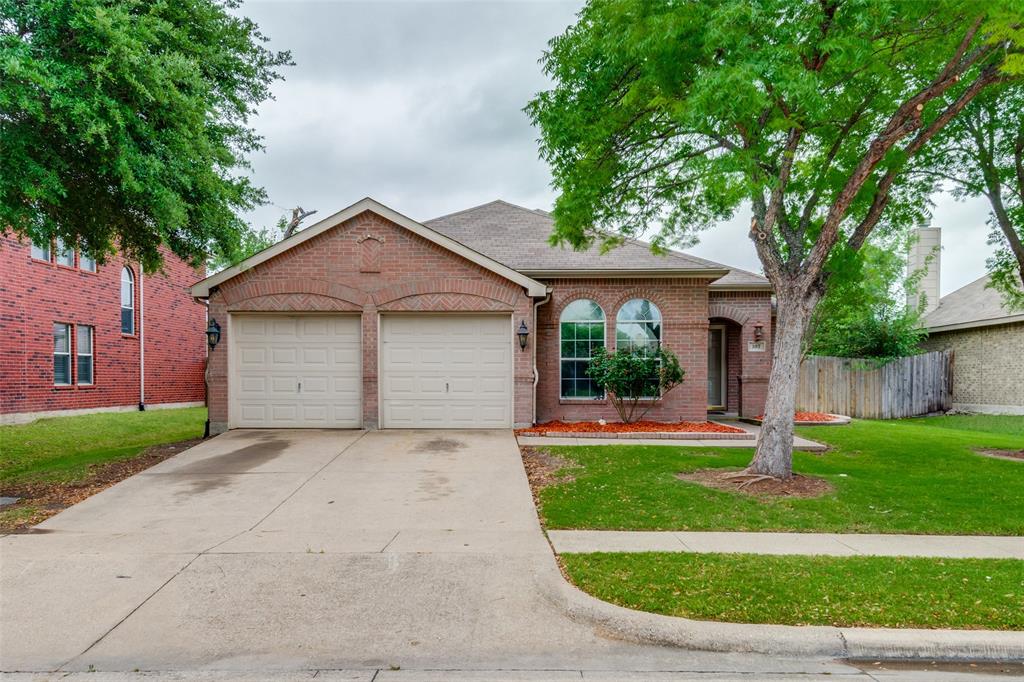 107 Bowie Street Forney, TX 75126 - Photo 25 of 25 a front view of a house with garden