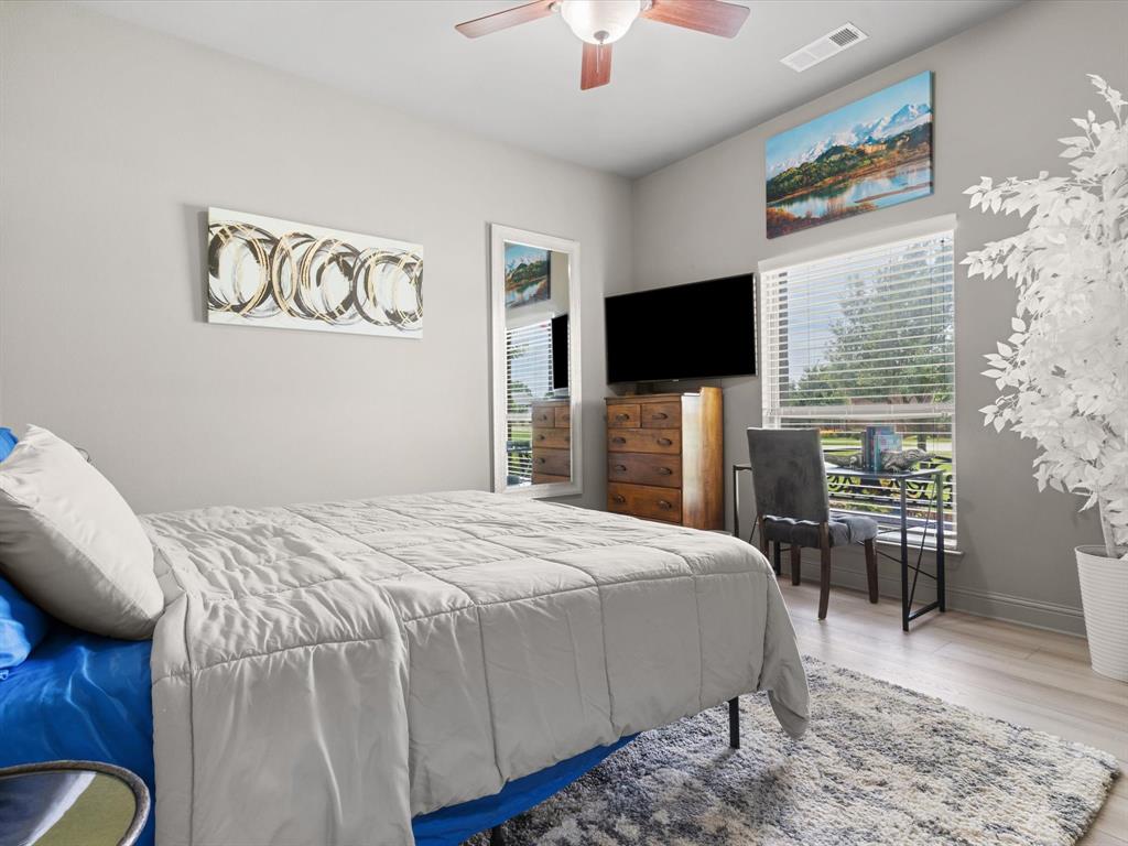 111 Old Base Road Aurora, TX 76078 - Photo 24 of 38 Versatile bedroom ideal for guests, family members, or a home office.