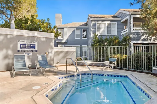 a view of a house with a swimming pool