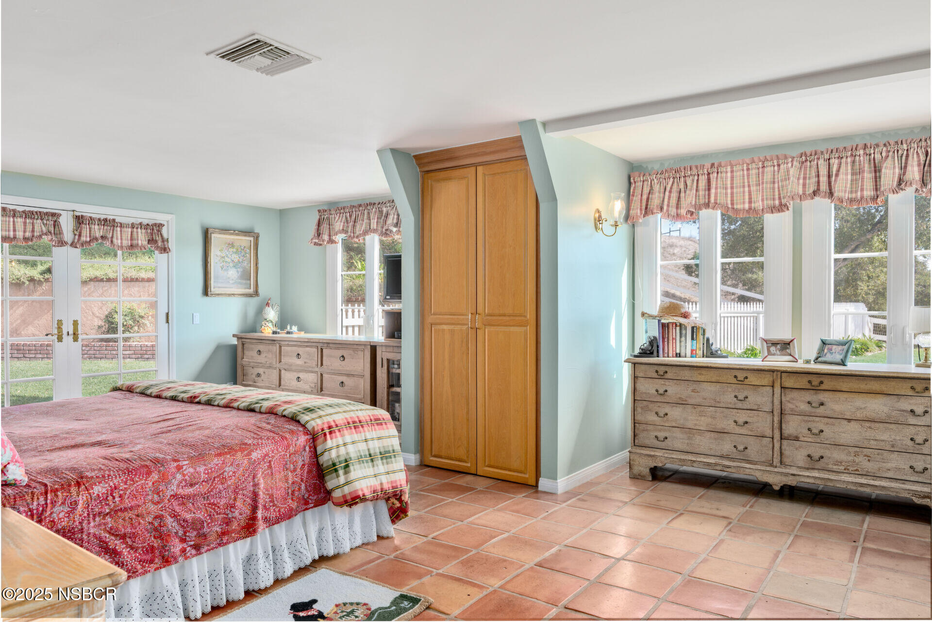 4086 East Oak Trail Road Santa Ynez, CA 93460 - Photo 16 of 57 a bedroom with a bed and a window