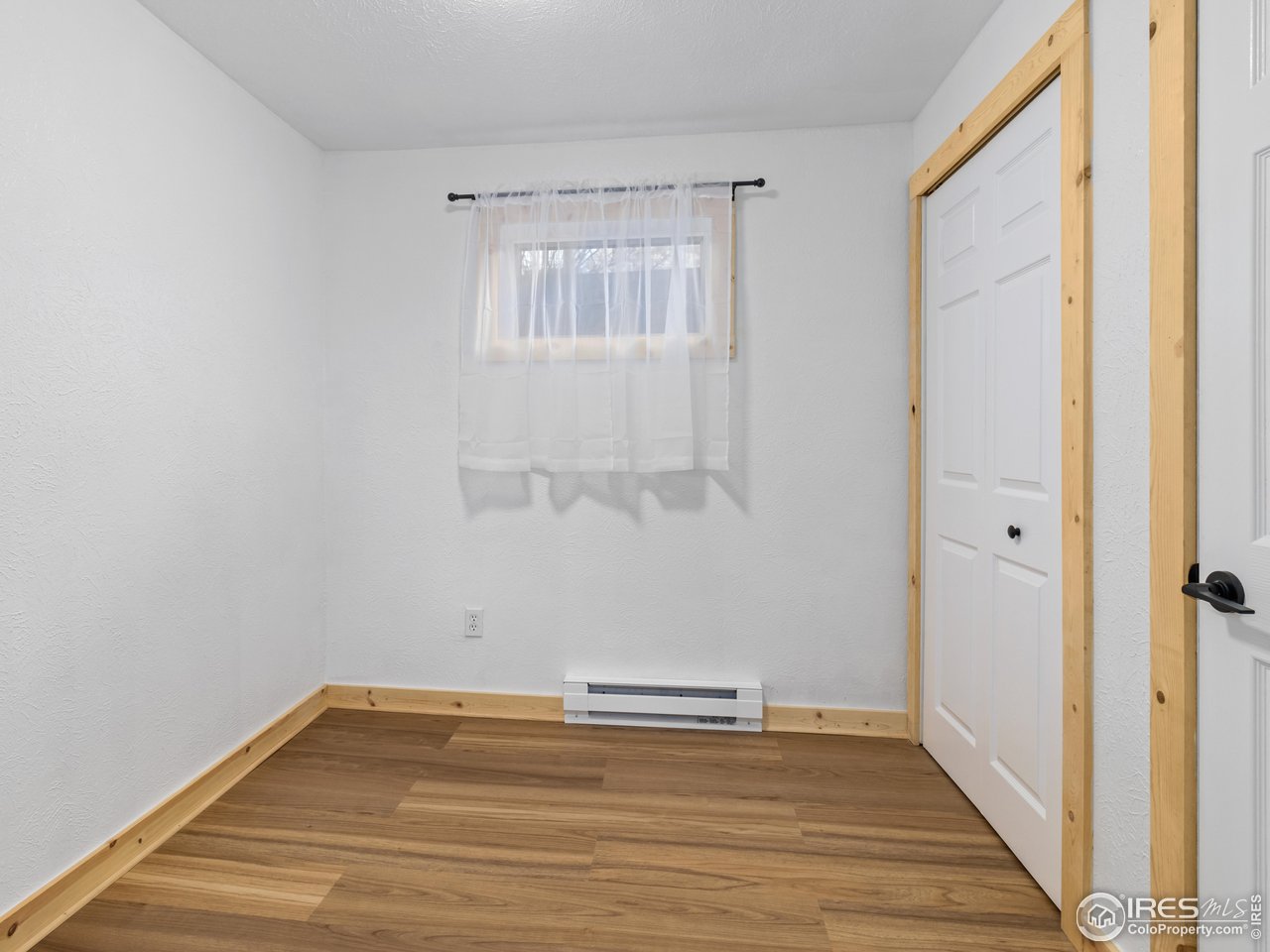 1873 Ranch Circle Estes Park, CO 80517 - Photo 25 of 33 Lower Level Extra Room-New Hot Water Heater in One of the Closets