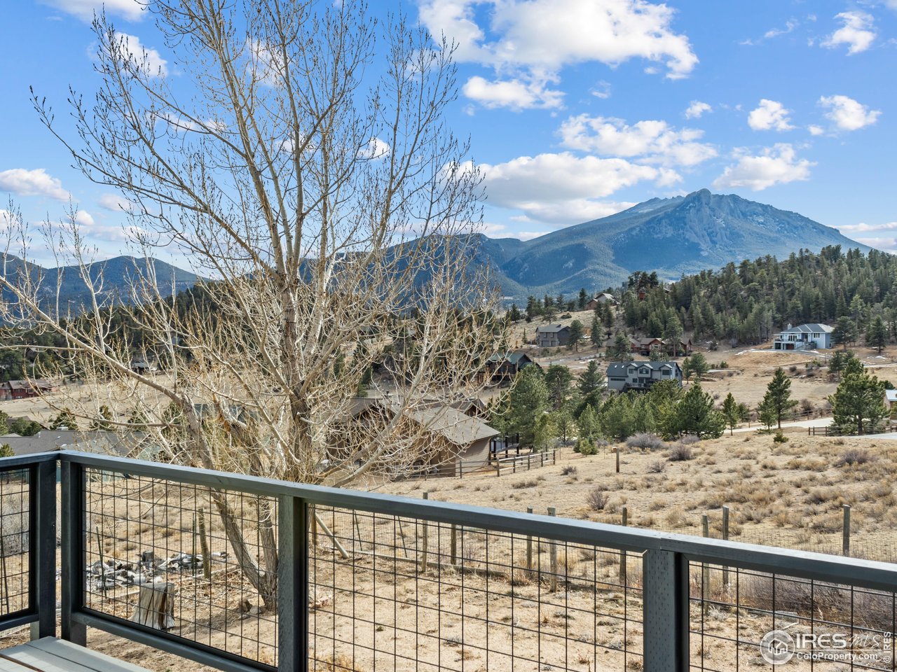 1873 Ranch Circle Estes Park, CO 80517 - Photo 9 of 33 Refinished Deck with New Railings and Views of Twin Sisters to the South