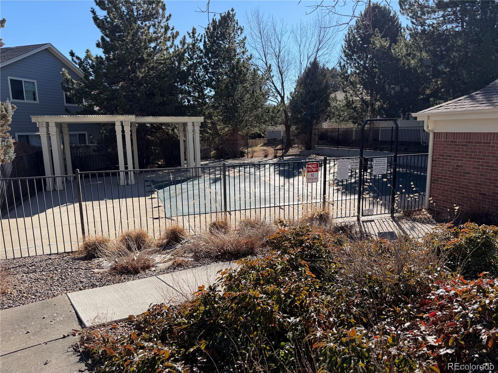 6369 Cole Lane Arvada, CO 80004 - Photo 21 of 21 a garden view with a bench
