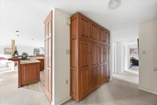 a room with furniture and gym equipment