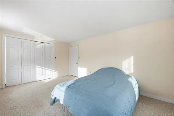 a view of a livingroom with furniture and windows