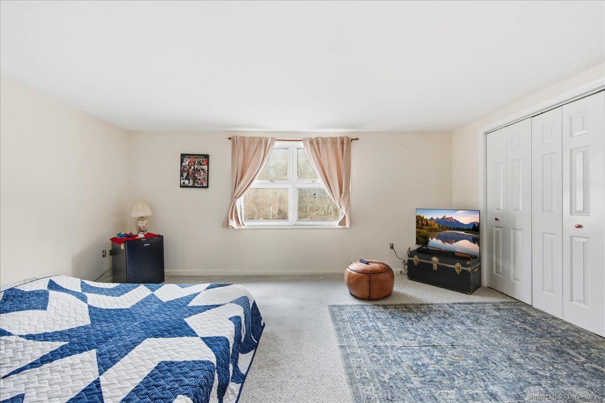 33 Deep River Road Essex, CT 06409 - Photo 16 of 40 One of three bedrooms